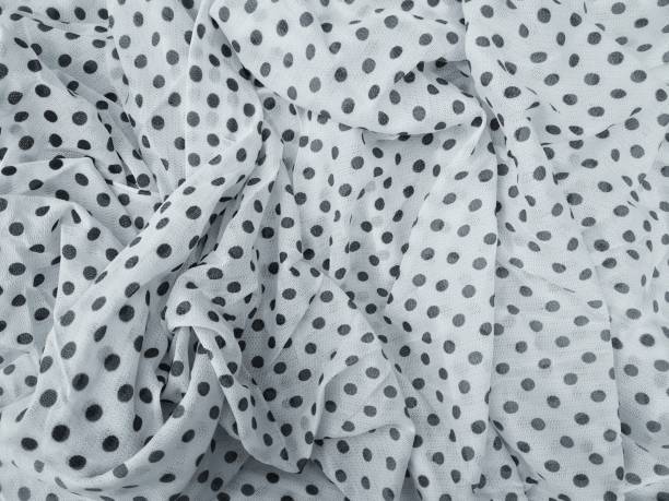 istock Polka dot White textile background. Crumpled Fabric curtain with folds 1307741077