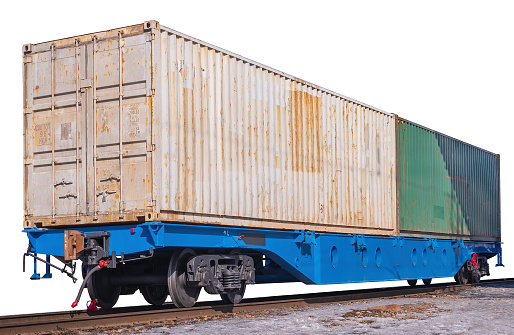 A 80-fts Idler flatcars with a two of intermodal 40-fts long containers isolated on the white background.
