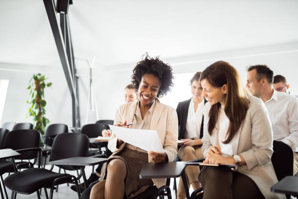istock Happy people on a business seminar, portrait. 1307742661
