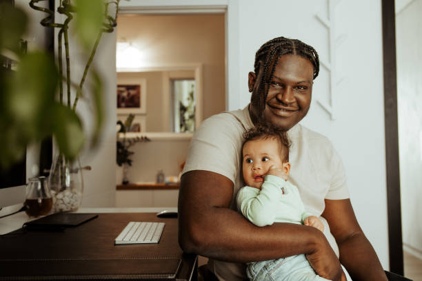 istock Daughter and father, sitting together. 1307742731