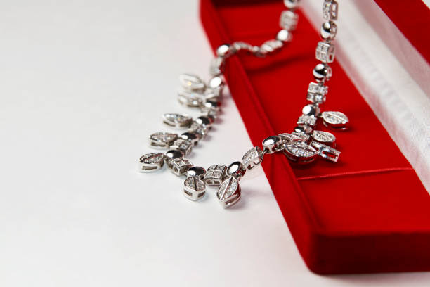 istock Elegant necklace with diamonds on white background with copy space 1307745057