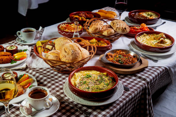 istock Balkans specialties on full restaurant table with drinks and coffee 1307746573