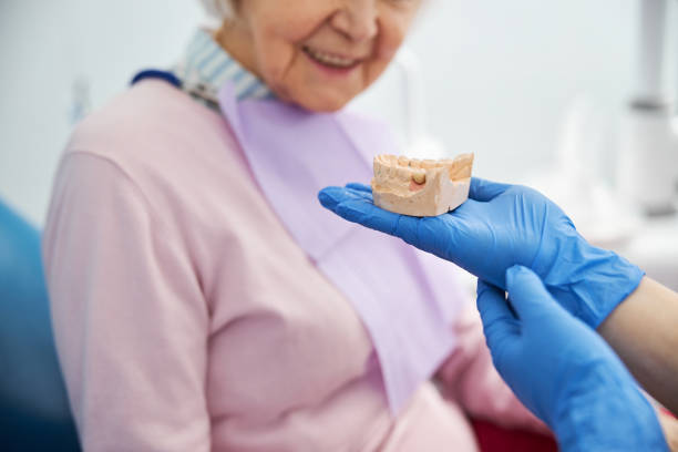 istock Dental cast inspected by an aged female 1307747030
