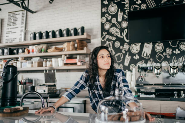 istock Owner of a small shop at work 1307747067