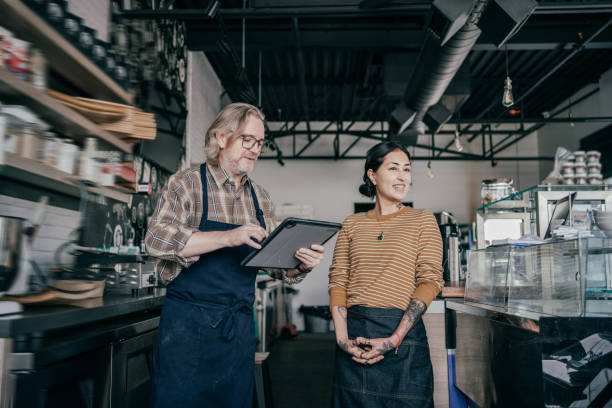 istock Inventory organization - owners working in  coffee shop 1307747131