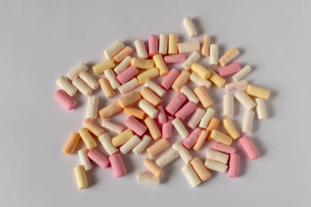 istock Colorful marshmallows on a light background. Close-up. Selective focus. 1307748356