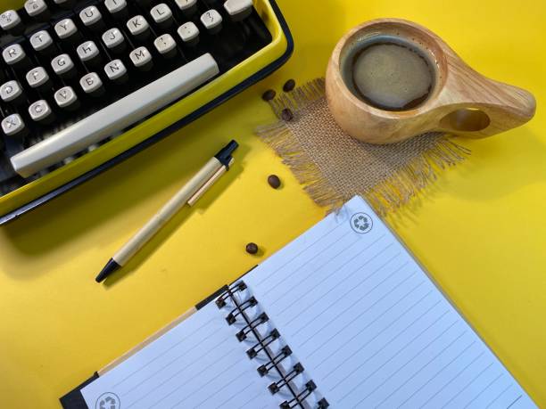 Notebook and typewriter prepared for work