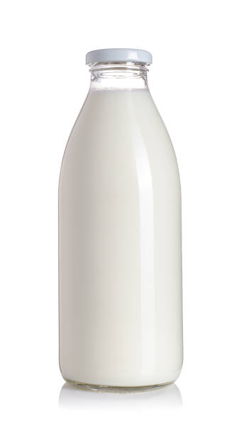 istock Milk glass bottle. Isolated on white background 1307750755