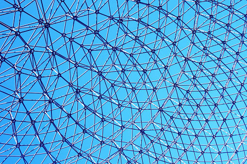 Detail of a steel roof with blue background