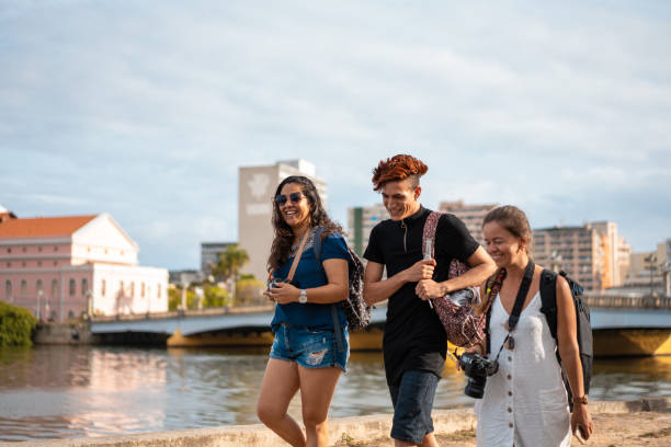 istock Tourists walking in front of the Capibaribe River in Recife, Pernambuco 1307751932