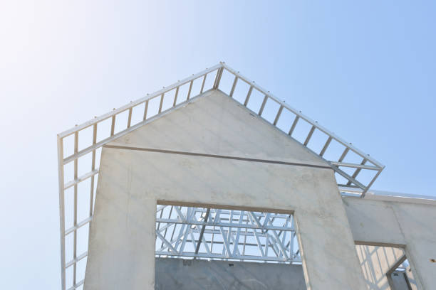 istock The house, while construction, is installing a steel roof frame using zinc-aluminum material For durability and resistance to the home 1307752255