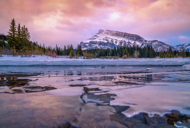 istock Cloudy Sky Over Snow And Ice At Cascade Ponds 1307753819