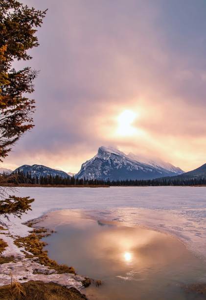 istock Sunrise Glowing Over A Wintry Vermilion Lake 1307754751