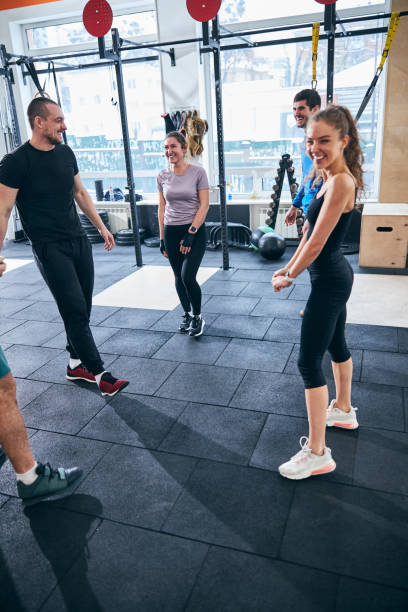 istock Smiling pleased sporty people enjoying their workout 1307757449