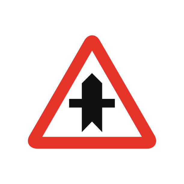istock Triangular traffic signal in white and red, isolated on white background. Warning of crossroad ahead with priority 1307758547