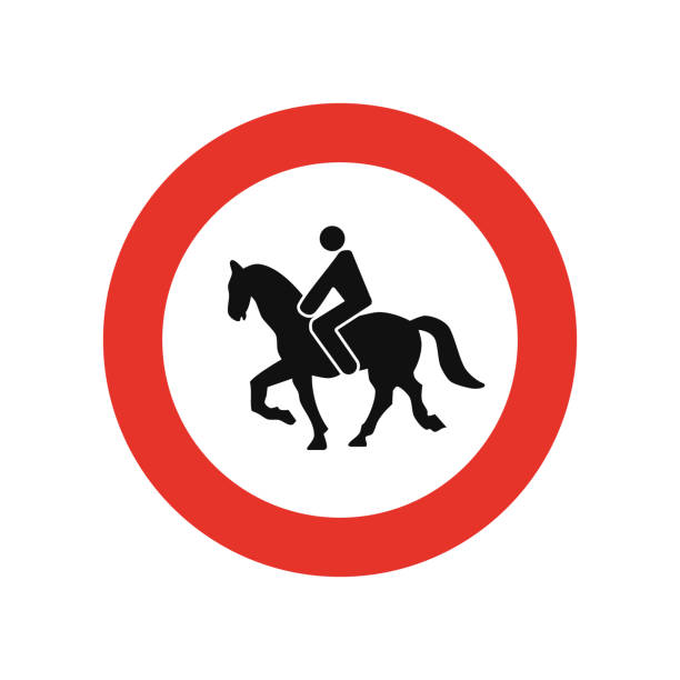 istock Rounded traffic signal in white and red, isolated on white background. Entry prohibited for mount animals 1307758783