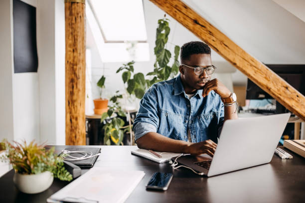 istock Young man  having video call at his home office 1307759006