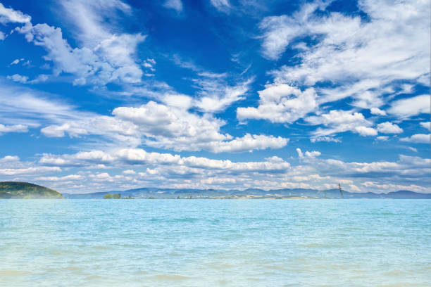 panorama seascape blue sea and blue sky in summer with hills on background.