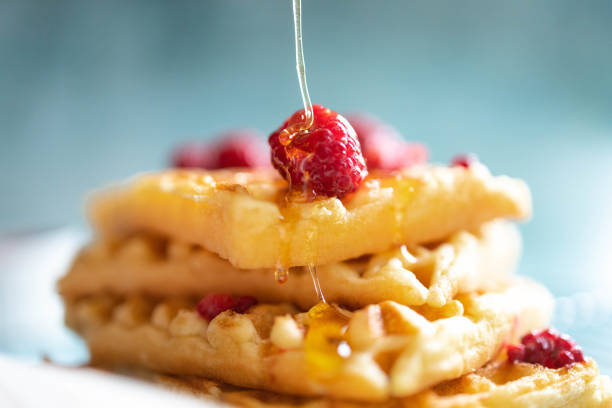 Belgian waffles with berries and honey