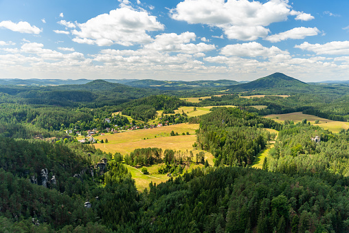 View from mountain to Jetrichovice, Bohemian Switzerland, Czech Republic at sunny summer day