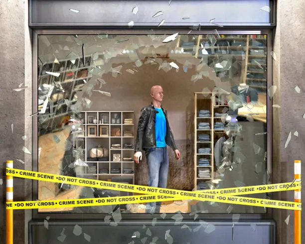 Photo of Destroyed boutique showcase broken on pieces of glass, crime tape beside and mannequin behind, concept of vandalism, robbery, 3d illustration