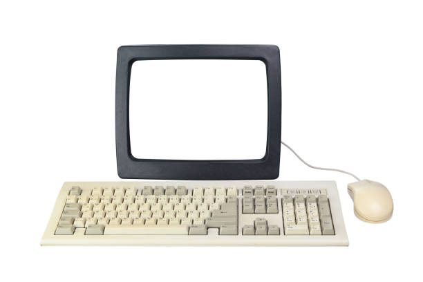 istock Old computer from the 1990s with a white screen for adding videos and images, retro keyboard and mouse isolated on a white background. 1307763207