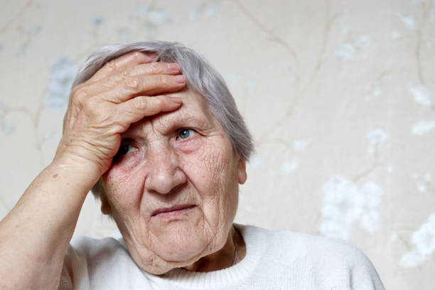 istock Elderly woman put her hand on forehead 1307763481