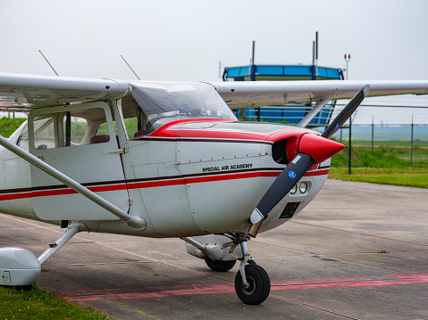 Cessna 172 Skyhawk small four-seat, single-engine, high wing, fixed-wing aircraft parked at the tarmac of Lelystad airport in Flevoland, The Netherlands