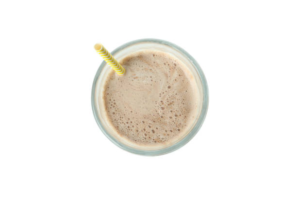 istock Glass of chocolate milkshake isolated on white background 1307767825