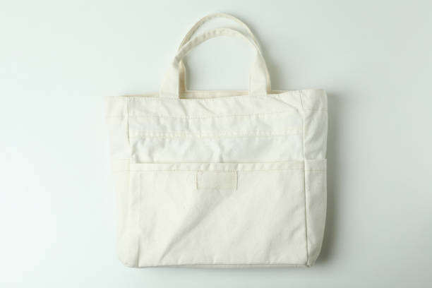 istock Blank stylish eco bag on white background 1307767868