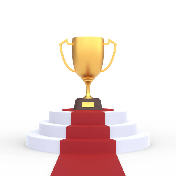 istock Round podium with trophy cup and  red carpet isolated on white background 1307768207