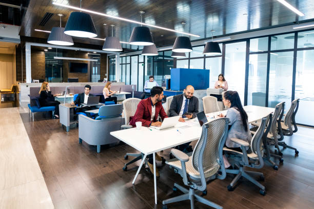 istock Hot desking in coworking office 1307772502