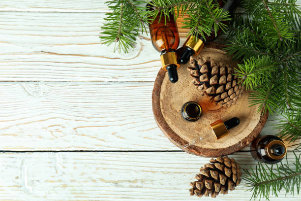 istock Aromatherapy concept with pine oil on white wooden table 1307772660