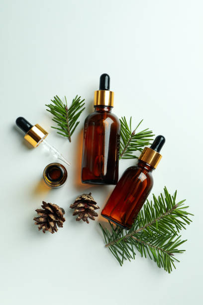 istock Flat lay with pine oil on white background 1307772845