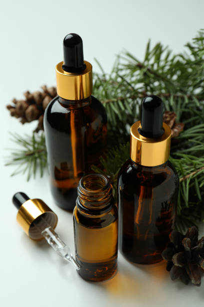 istock Aromatherapy concept with pine oil on white background 1307773108