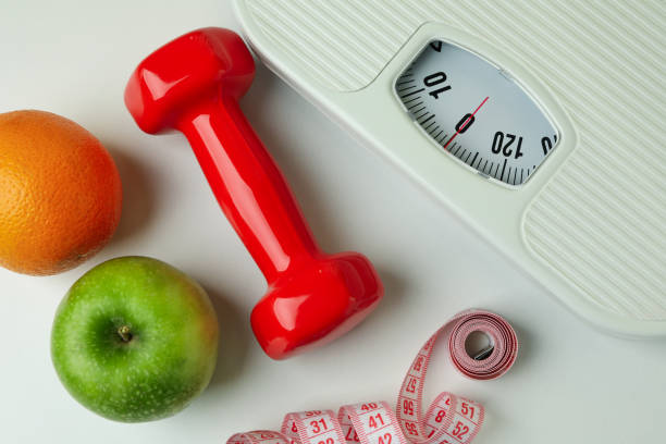 istock Weight loss accessories on white background, close up 1307773276