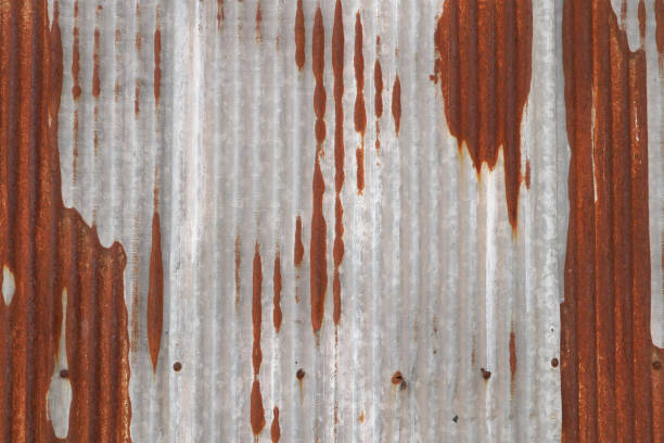 istock Rusting metal or siding,Old metal sheet roof texture 1307774707