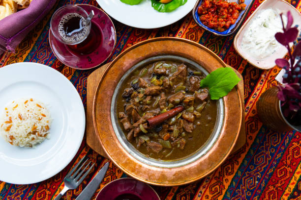 istock Turkish mutancana from lamb stewed with dried fruits 1307778063