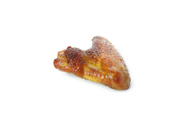 istock Baked chicken wing isolated on white background 1307779115