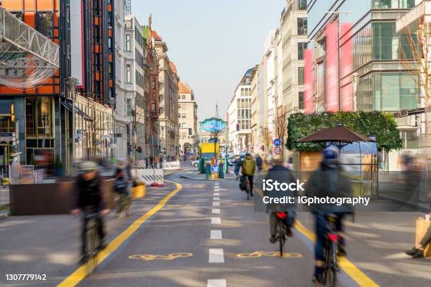 Commuting To Work On A Popup Bike Lane In The City Center Stock Photo - Download Image Now