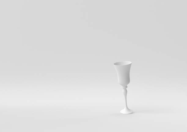 istock White Wine glass floating in white background. minimal concept idea creative. monochrome. 3D render. 1307779485