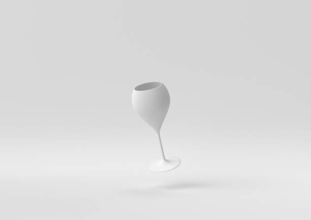 istock White Wine glass floating in white background. minimal concept idea creative. monochrome. 3D render. 1307779504