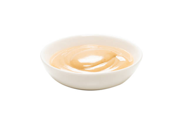 istock Mushroom sauce in a bowl isolated on white background. 1307779813
