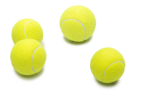 istock Tennis balls isolated on white background. 1307779850