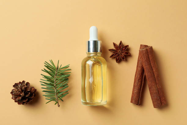 istock Aromatherapy concept with pine oil on beige background 1307780945