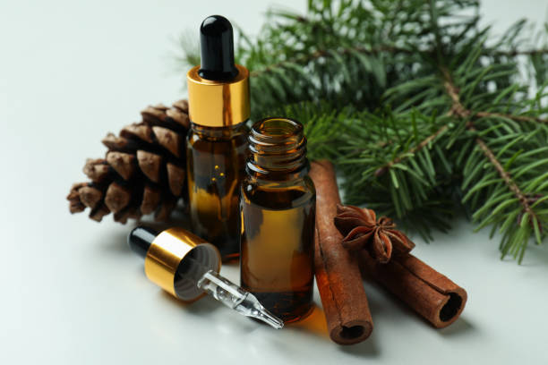 istock Aromatherapy concept with pine oil on white background 1307781126