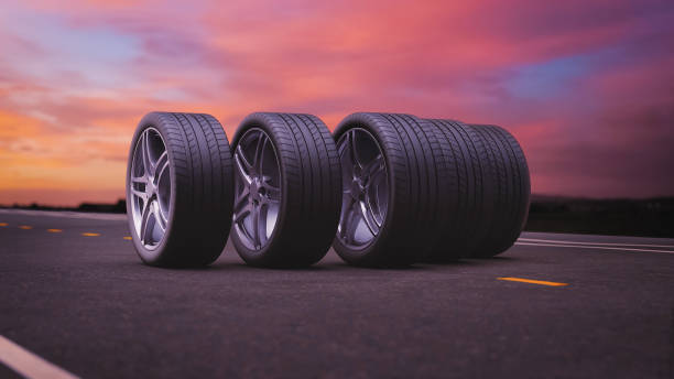 istock 3d render car tires rolling on asphalt in the sunset 1307781223