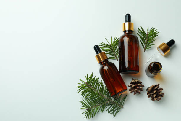 istock Flat lay with pine oil on white background 1307781747