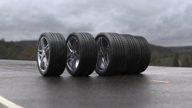 istock 3d render car tires rolling on wet asphalt in the rain with a thunderstorm 1307781766