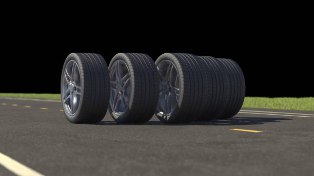 istock 3d render car tires rolling on asphalt in the summer on a black background 1307781820